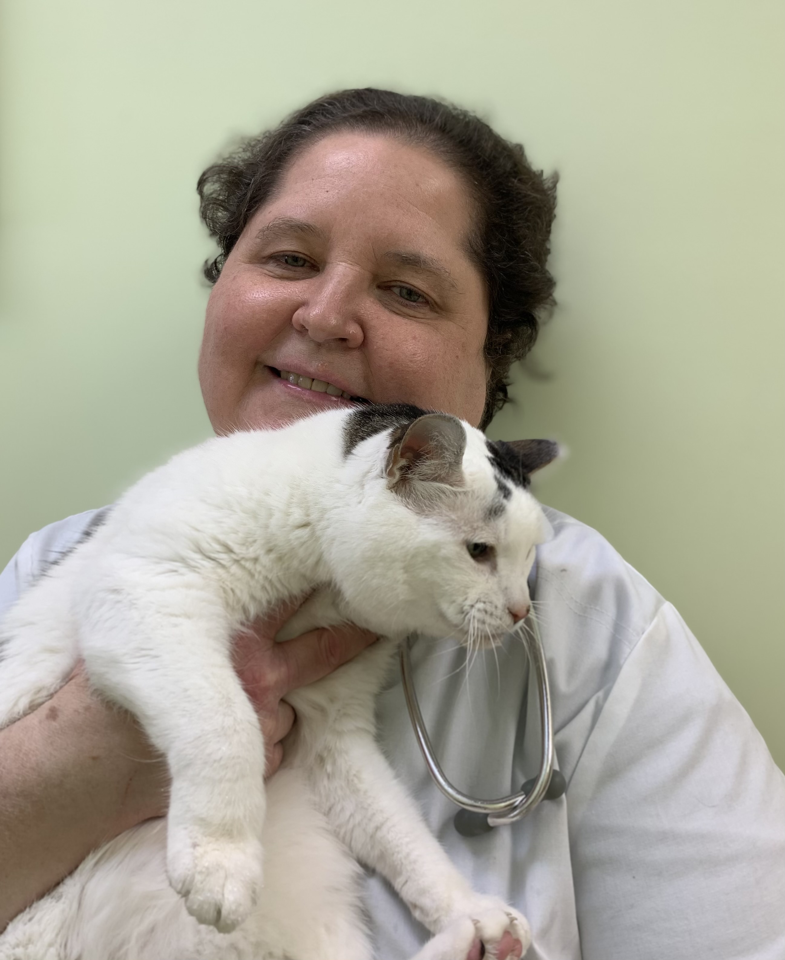 Dr. Cathy Palomar holding a cat